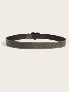 Detail view of stylish brown patterned leather belt with unique buckle for daily wear.