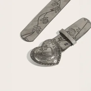 Vintage gray leather belt with ornate heart buckle and floral print for stylish daily wear.
