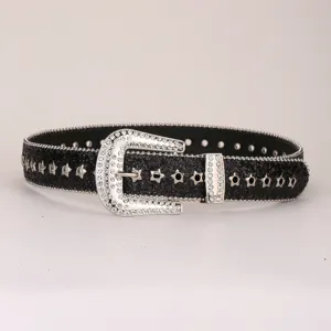Close-up detail of a sparkling black rhinestone belt with ornate crystal buckle and star eyelets.