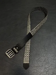 Black punk rock triple row grommet leather belt with metal square eyelets and triple buckle.