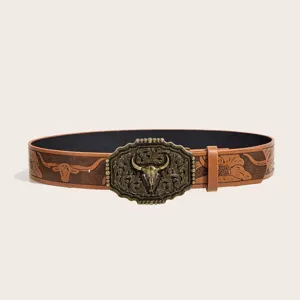 Vintage Western cowboy leather belt with bull skull buckle and embossed floral strap.