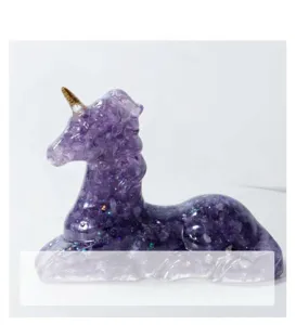 Crystal chip unicorn figurine detail view, cute purple gemstone pegasus home desk decor.