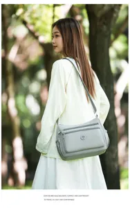Leichte Freizeittasche aus Nylon für Damen, praktische Umhängetasche mit vielen Fächern.