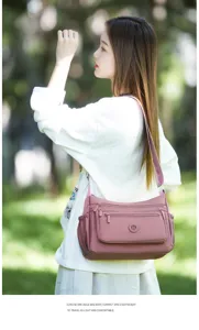 Damen Nylon Umhängetasche lässige Mehrfachfächer Reise Dumpling Tasche 2026 neu