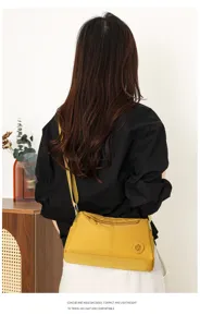 Damen Nylon Umhängetasche lässig leichte schöne Schultertasche kompakte Handtasche in gelb