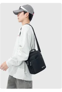 Herren Nylon Umhängetasche vertikal Business Pendler Messenger Tasche mit Griff.