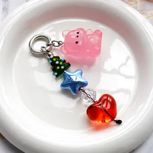 Portachiavi con ciondoli multi-elemento carini con orsetto rosa, stella e cuore per borse e telefoni.
