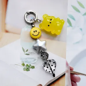 Simpatico portachiavi orsetto gommoso giallo smiley stella ciondolo borsa donna