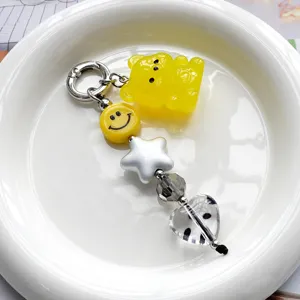 Simpatico portachiavi con ciondolo orsetto giallo stella cuore smiley per borsa donna