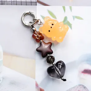 Grazioso ciondolo portachiavi orso stella cuore per borsa donna accessorio stile dolce.