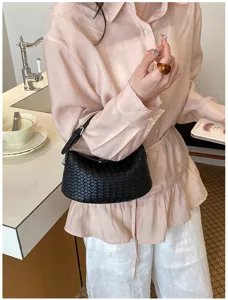 Classic woven shoulder bag for women, elegant retro underarm handbag for summer commute.