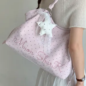 Casual pink polka dot tote bag with cute star pendant, large capacity stylish shoulder bag for women.
