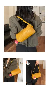 Retro geweven lederen cilinder schoudertas voor dames, stijlvolle gele crossbody tas nieuw.