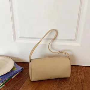 Stijlvolle minimalisten beige cilindrische schoudertas voor dames, trendy alledaagse tas.
