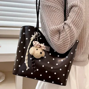 Black and white polka dot tote bag for women, large capacity stylish shoulder bag commuting.