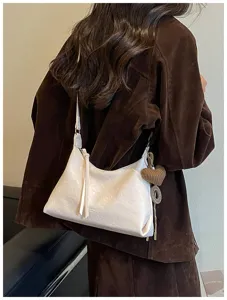 Élégant sac porté épaule hobo en cuir ciré blanc pour femme, design rétro décontracté et chic.