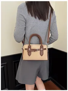Women's retro suede Boston shoulder crossbody bag, detail view showing daily commute style.