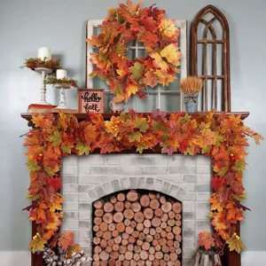 Kunstmatige herfst esdoornblad slingers en krans voor thuis deur en haard decoratie