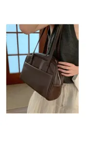 Retro minimalist brown leather shoulder bag for women, chic daily axilla handbag.