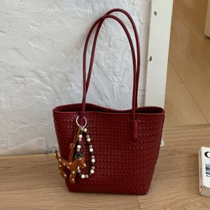 Woven leather tote bag for women, large capacity vintage shoulder bag with cute dog charm.