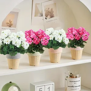 Detailed shot of artificial geranium potted plants in ice cream cone pots for home decor.