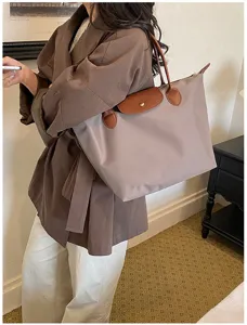 Waterproof nylon tote bag, large capacity stylish shoulder travel bag with leather flap.
