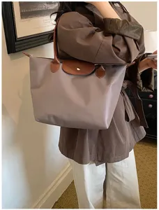 Stylish nylon folding tote bag, casual large capacity shoulder handbag for women daily use.