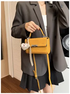 Women fashion retro PU leather shoulder crossbody bag with cute heart charm daily commute.