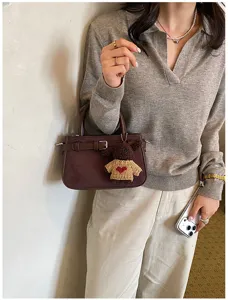 Retro suede shoulder handbag with cute knit pendant stylish women commuter crossbody bag