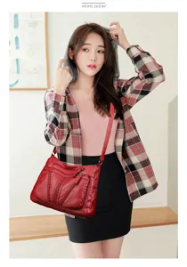 Women's large capacity multi-pocket leather shoulder bag casual crossbody tote handbag.