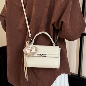 Stylish retro mini square shoulder bag for women, chic daily commuting crossbody handbag.