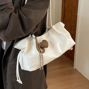 Slouchy retro large capacity women shoulder bag with heart pendant casual crossbody tote.