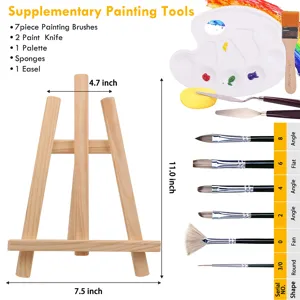 Set di strumenti di pittura con cavalletto da tavolo in legno, pennelli, tavolozza e spatole.