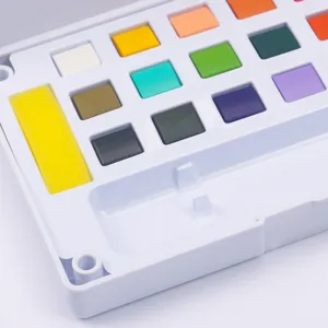Set de pintura de acuarela sólida portátil con bloques de color vibrantes y esponja.