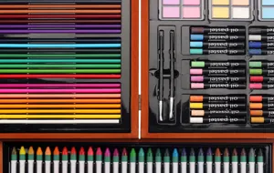 142-piece wooden art painting set with colored pencils, oil pastels, and watercolor cakes.