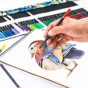 Detailed view of 72 colored pencil set in canvas roll, drawing vibrant artwork on sketchbook.