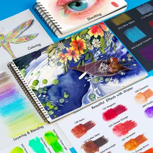 Water-soluble colored pencils set art drawing sketching coloring swatches flat lay view.