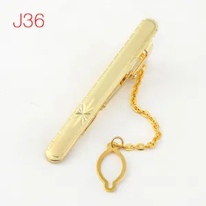 Stylish gold metal tie clip for men featuring a security chain and jacquard formal suit accessory