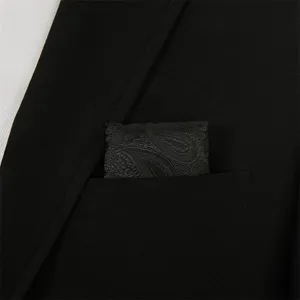 Black paisley pocket square, men silk jacquard handkerchief detail for formal wedding suit.