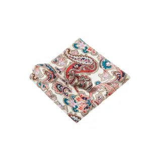 Men's paisley pocket square with matching cufflinks set, vintage accessory for suits.