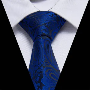 Close up view of blue and black paisley jacquard necktie detail texture pattern design.