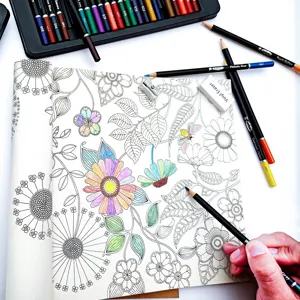 Detailed close-up view of the colored pencil set and flower coloring book in use.