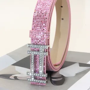 Stijlvolle roze strass damesriem met sprankelende glanzende band en zilveren H gesp.