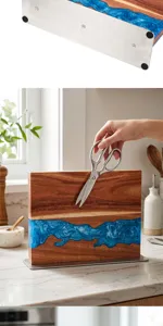 Bloc à couteaux aimanté en bois d'acacia naturel, résine époxy bleue et base en inox.