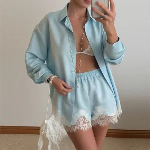 Summer casual light blue satin long sleeve shirt and lace trim shorts set for women.