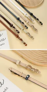 Close-up details of minimalist thin women leather belt with stylish golden metal knot buckle.
