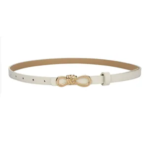 Close-up view of a slim white leather belt featuring an elegant gold metal knot buckle design.