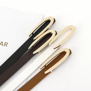 Detail view of women thin leather belt with gold metal buckle in multiple stylish colors.