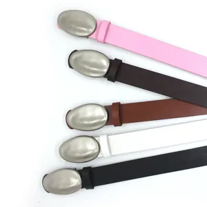 Detailed view of trendy leather belt featuring unique oval metal buckle in multiple stylish colors.