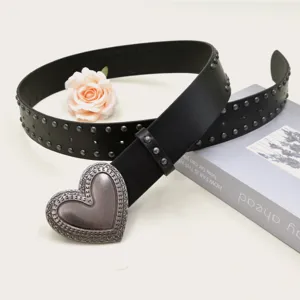 Black PU leather belt featuring a vintage engraved heart metal buckle and metallic stud details.